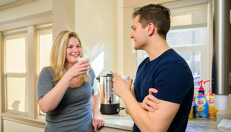 two patients chatting over coffee