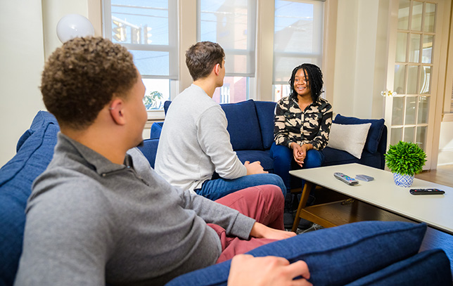 a group of people in a group therapy session